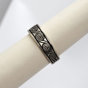 Carved mens wedding band ring in 14K white gold with greek key wave design and black background