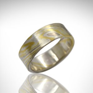 mokume gane wedding band with palladium white gold, 18k yellow gold and sterling silver, hand fabricated by Morgan's Treasure