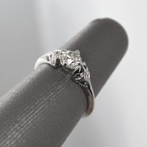 one of a kind engagement ring with old european cut diamond in 14k white gold with edwardian vintage inspired filigree setting and accent diamonds with millgrain detail