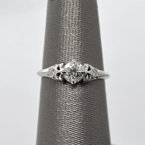 one of a kind engagement ring with old european cut diamond in 14k white gold with edwardian vintage inspired filigree setting and accent diamonds with millgrain detail