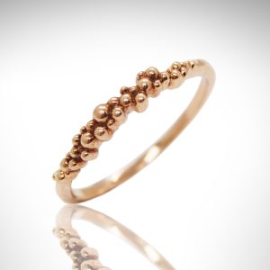 rose gold stackable ring with bubble design in 14k