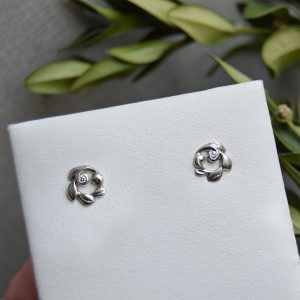 dainty diamond earrings in 14k white gold in leaf vine design with satin finish. Designed by Morgan's Treasure